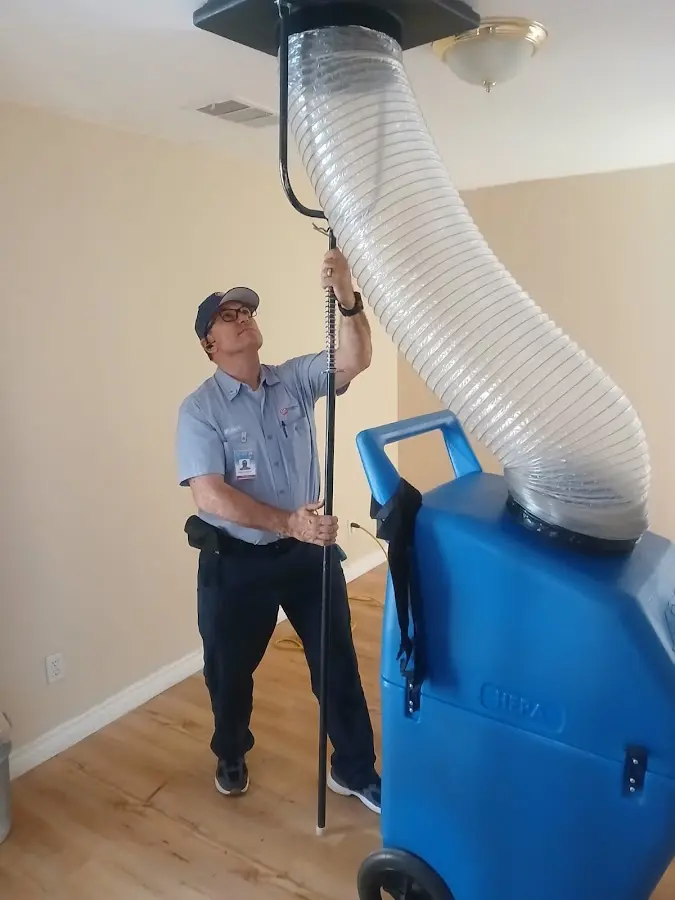 Furnace Tune-Up technician using HEPA equipment in Citrus Heights